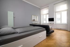 Posteľ alebo postele v izbe v ubytovaní Central Vienna-Living