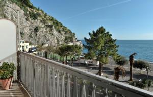 a balcony with a view of the ocean at Il Sagrato - Ravello Accommodation in Minori