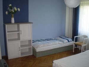 Voodi või voodid majutusasutuse apartman pro 4 osoby toas