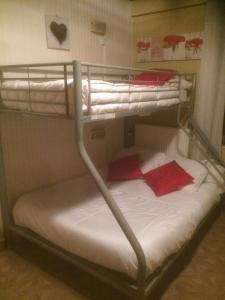 Ένα ή περισσότερα κρεβάτια σε δωμάτιο στο Hotel Edelweiss