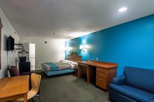 TV a/nebo společenská místnost v ubytování Motel 6-Azle, TX