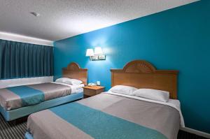Postel nebo postele na pokoji v ubytování Motel 6-Azle, TX