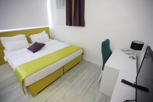 Katil atau katil-katil dalam bilik di Hotel Boutique Libris