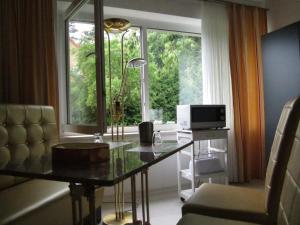 TV a/nebo společenská místnost v ubytování Boardinghouse Wittenberg