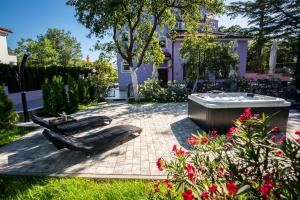 Zahrada ubytování Hotel Villa Sandi - free parking