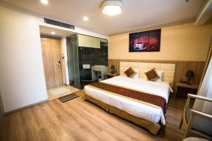 Ruby Hotelにあるベッド