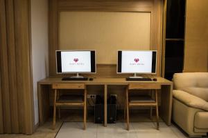 Ruby Hotelにあるテレビまたはエンターテインメントセンター