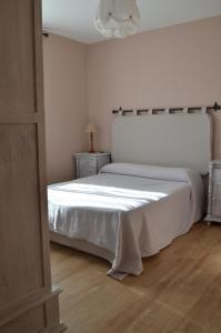 Postel nebo postele na pokoji v ubytování Apartamento Plaza Castañuelas