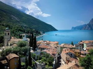a view of a town next to a body of water at B&B La Betulla in Rovereto