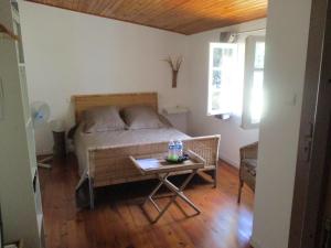 Postel nebo postele na pokoji v ubytování Bienvenue dans notre petit paradis
