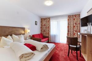Łóżko lub łóżka w pokoju w obiekcie Apartment Bergsee