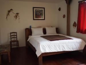 Postel nebo postele na pokoji v ubytování Villa Loti