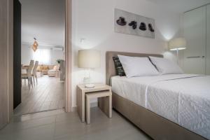 Ένα ή περισσότερα κρεβάτια σε δωμάτιο στο Villa Matina