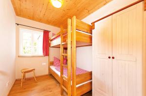 Postel nebo postele na pokoji v ubytování Ferienhaus Winterbergblick, Sächsische Schweiz