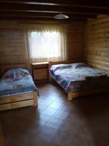 Postel nebo postele na pokoji v ubytování Pulemchanka