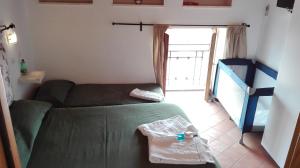 Postel nebo postele na pokoji v ubytování Casa Falcone B&B