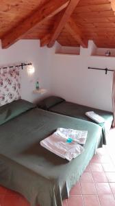 Postel nebo postele na pokoji v ubytování Casa Falcone B&B