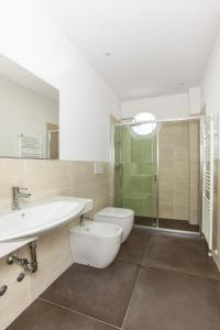 Koupelna v ubytování Hotel Houston Suites