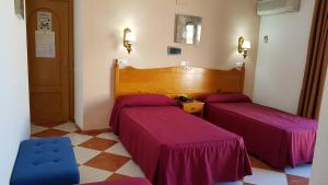 Postel nebo postele na pokoji v ubytování Hotel Cabo de Mar