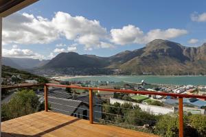 a view from the balcony of a house with mountains at The Loft in Hout Bay
