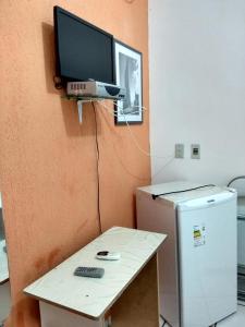 TV/trung tâm giải trí tại Pousada Terra do Sol