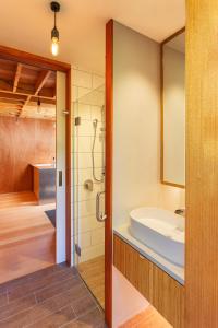 A bathroom at Punakaiki Forest Retreat