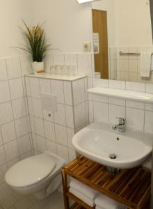 Ванная комната в Ferienhaus Vier Jahreszeiten