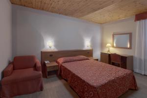 Een bed of bedden in een kamer bij Terme Di Monte Valenza