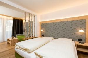 Voodi või voodid majutusasutuse Residence Garni Stella toas