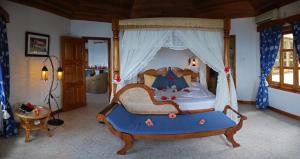 Postel nebo postele na pokoji v ubytování Patatran Village Hotel
