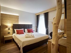 Postel nebo postele na pokoji v ubytování Hotel Belvedere Srl