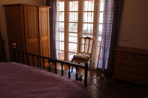 Postel nebo postele na pokoji v ubytování Casa los Almendros