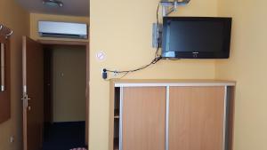 A television and/or entertainment centre at Lehár panzió