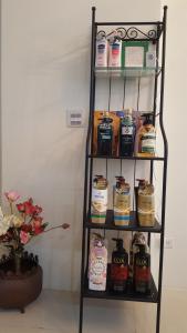 a shelf filled with lots of jars of food at Bai Yun Ge Homestay in Jiaoxi