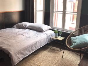 Voodi või voodid majutusasutuse Amsterdam Red Light Bed & Breakfast toas