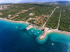 an aerial view of a beach with boats in the water at Holiday Park Mandrice in Mandre