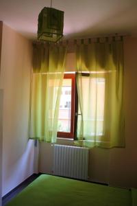 A bed or beds in a room at Un Posto Al Sole