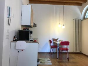 Kuchyň nebo kuchyňský kout v ubytování MyRoom Città Alta 1