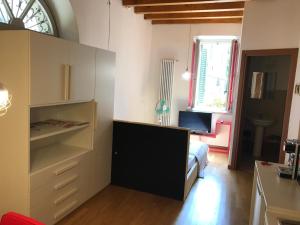 TV a/nebo společenská místnost v ubytování MyRoom Città Alta 1