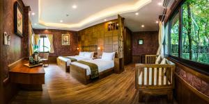 Postel nebo postele na pokoji v ubytování Naiyang Park Resort - SHA Extra Plus + 29 fotografií