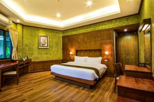 Postel nebo postele na pokoji v ubytování Naiyang Park Resort - SHA Extra Plus
