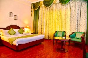 Postel nebo postele na pokoji v ubytování Hotel Sepal
