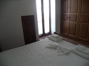 Posteľ alebo postele v izbe v ubytovaní Ilis Villas