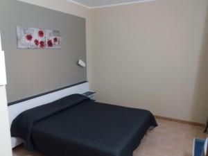 Postel nebo postele na pokoji v ubytování Hotel Belvedere