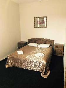 Postel nebo postele na pokoji v ubytování Central Hotel