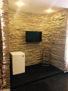 Kuchyň nebo kuchyňský kout v ubytování Central Hotel