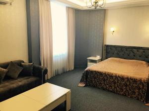 Postel nebo postele na pokoji v ubytování Central Hotel