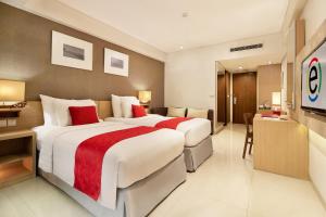 Ramada Encore by Wyndham Bali Seminyak 객실 침대