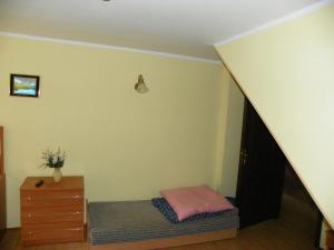 Postel nebo postele na pokoji v ubytování Dom Goscinny Andy
