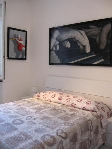 Ein Bett oder Betten in einem Zimmer der Unterkunft Stanza d'artista